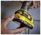 'A person installing a V20 Lithium Ion battery into a yellow and black cordless tool, showcasing its compatibility and design.'