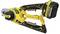 Yellow and black cordless pruning saw with a rechargeable battery, labeled 'Stanley Fatmax V20'.