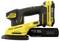 Yellow and black Stanley Fatmax cordless detail sander with ergonomic handle and dust collection cylinder.