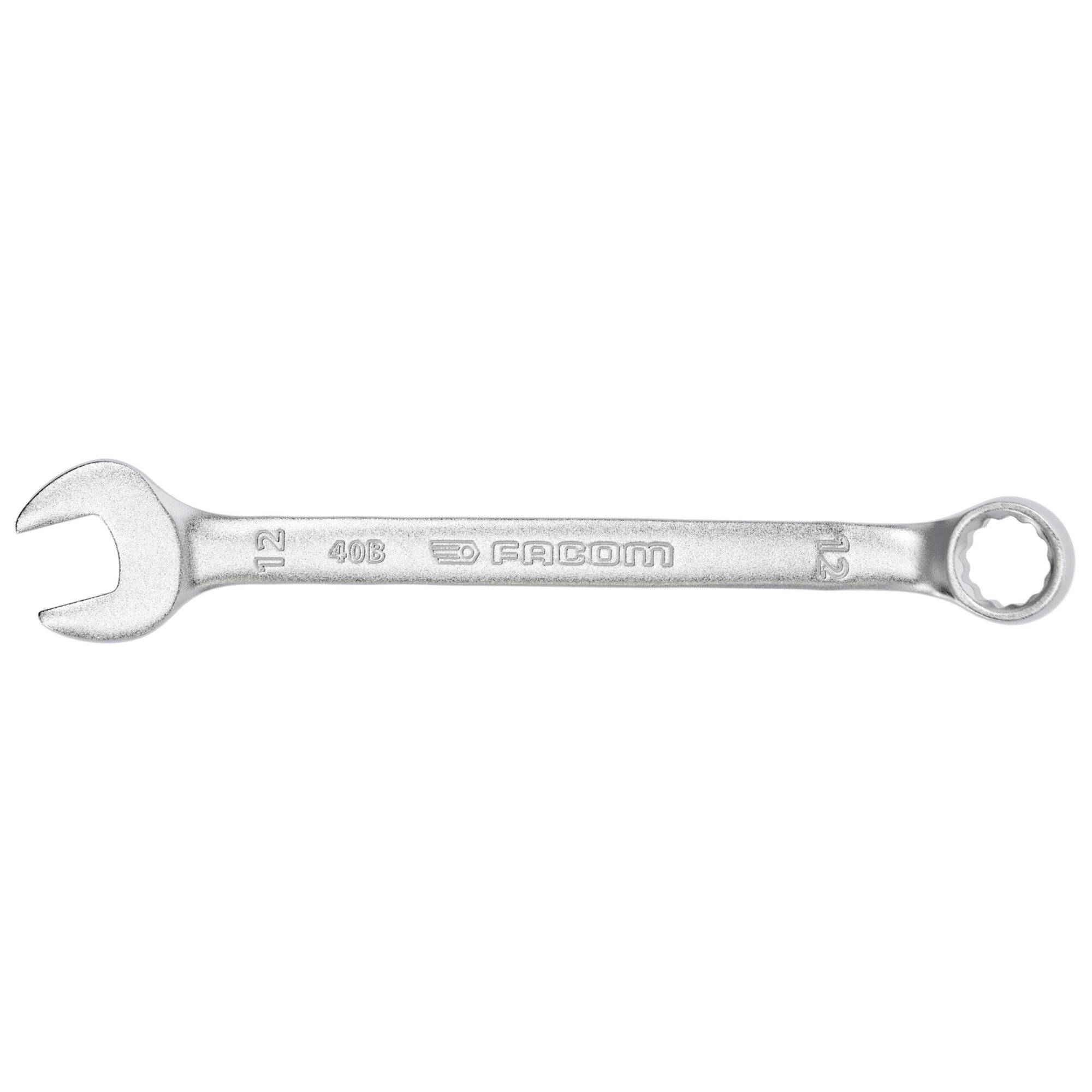 Silver metal wrench with open and closed ends, engraved with 'FACOM 12 406 13 15.' Used for tightening or loosening nuts and bolts.