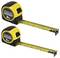 'Two Stanley FatMax tape measures, one extending to 8m and the other to 5m, with yellow and black casing and visible measurement markings.'