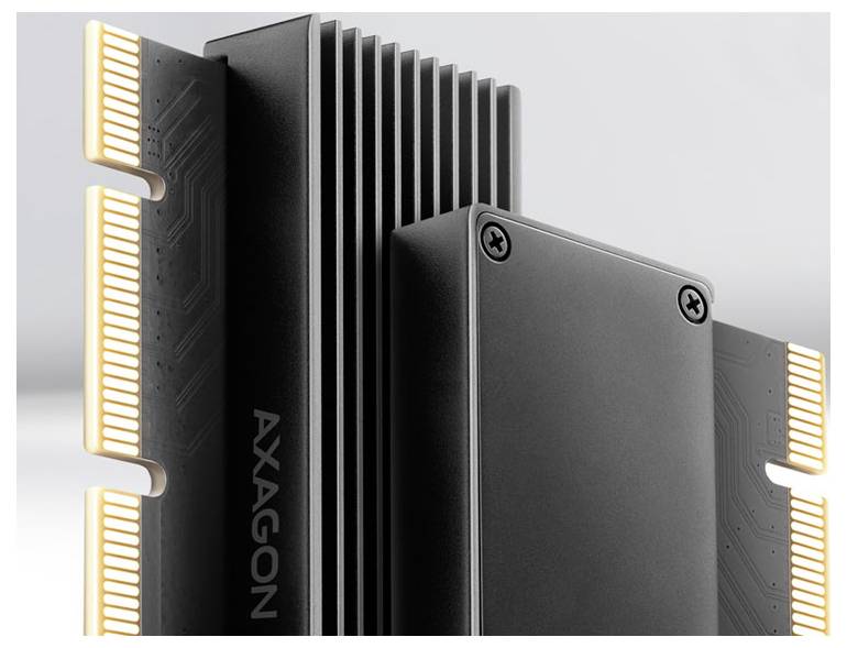 Close-up of an AXAGON computer heatsink with black fins and side-mounted illuminated connectors on a circuit board.