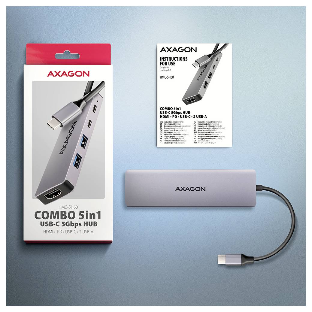 Axagon Combo 5-in-1 USB-C hub product box, instruction sheet, and silver hub with attached cable on a blue background.