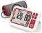 Digital blood pressure monitor showing 128/80 mmHg and pulse 79, with cuff attached.<br>