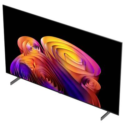 Flat-screen TV on stand displaying colorful abstract swirls on a black background.