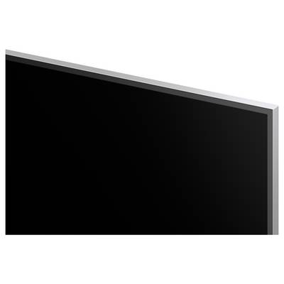 Black flat-screen monitor or TV shown in angled side view with a blank screen<br>