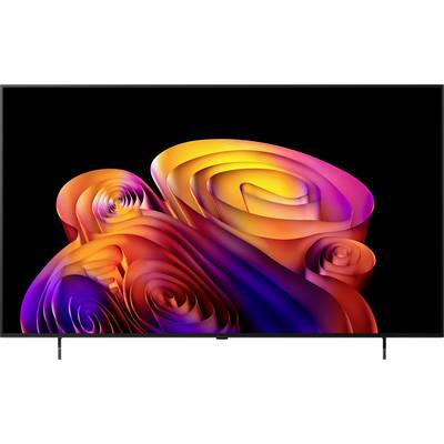 A flat-screen TV displays a vivid abstract swirl of multicolored 3D ribbon-like shapes on a black background.
