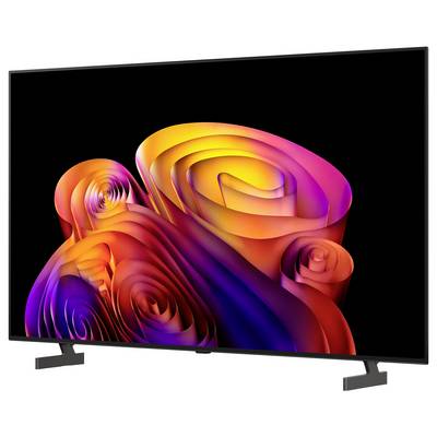 A flat-screen TV displaying a colorful abstract 3D swirl pattern on a black background.