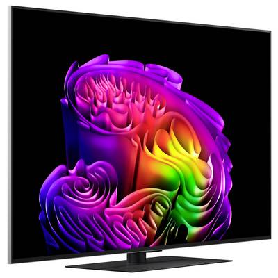 A flat-screen TV displaying a colorful abstract 3D spiral pattern on a black background.<br>