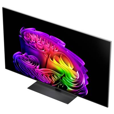 A flat-screen TV displays a vivid abstract multicolor swirl on a black background, shown at an angle with a pedestal stand.