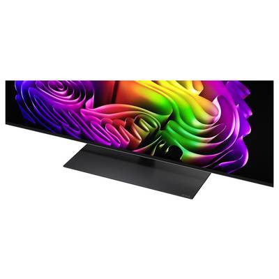Flat-screen monitor displaying a colorful abstract swirl wallpaper on a black stand, shown against a white background.