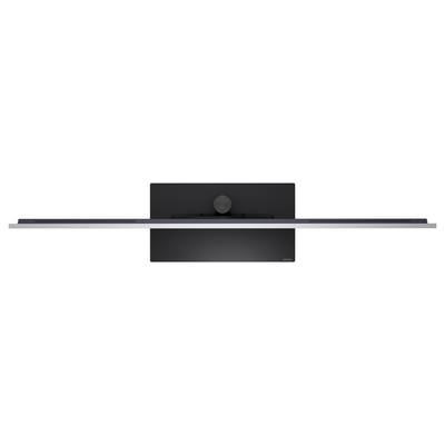 A slim black monitor shown from the back, centered on a white background, with a wide stand and circular hinge or mount in the middle.