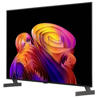 Flat-screen TV with a black frame displaying abstract colorful swirling shapes on a dark background, shown at an angle with stand.<br>