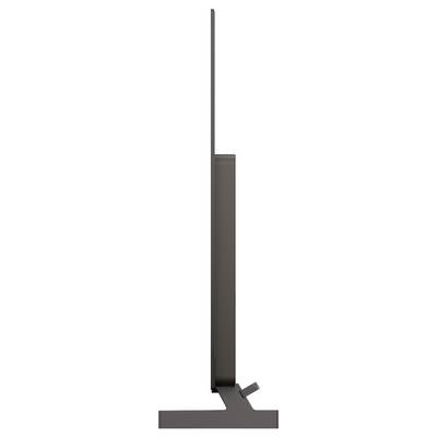 Side view of a flat-screen monitor on a stand with a rectangular base.