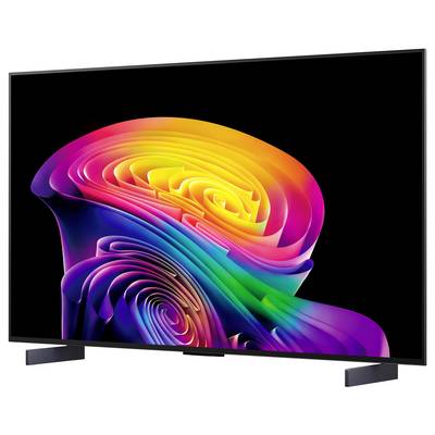A flat-screen TV displaying a vibrant abstract swirl of neon pink, yellow, blue, green, and purple on a black background.