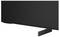 Black flat-screen TV on a stand, shown at an angle on a white background.
