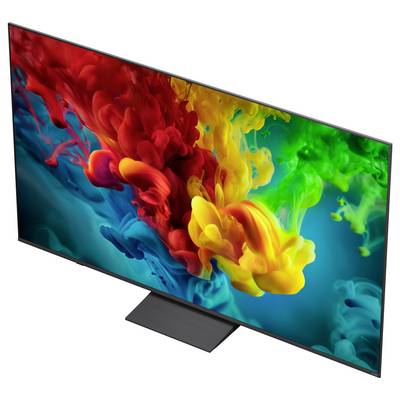A flat-screen TV displaying a colorful abstract ink-splash image on a white background.
