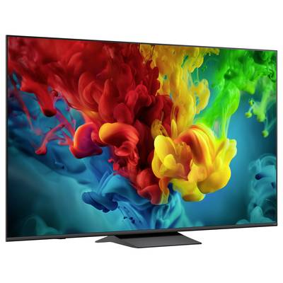 Flat-screen TV displaying a vivid abstract swirl of red, yellow, green, and blue ink-like colors on a dark background.
