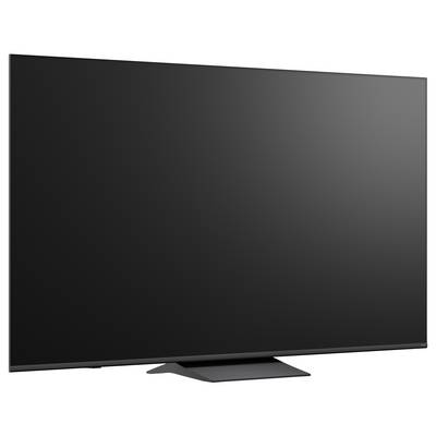 A large flat-screen television with a blank black screen on a stand.
