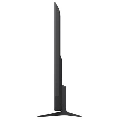 Side profile of a slim black flat-screen TV or monitor on a wide stand, shown against a white background.