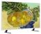 TV displaying a Van Gogh-style painting of a wicker basket filled with yellow and orange fruit, with tree branches overhead.