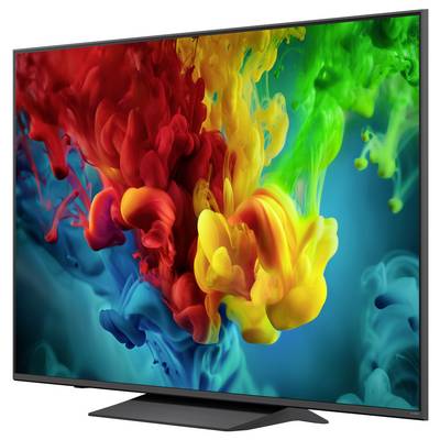 Flat-screen television displaying colorful red, yellow, green, and blue abstract ink clouds on a blue background.<br>