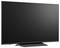 Flat-screen television with blank black screen on a stand, shown against a white background.