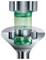 Cross-section of a machine mold or die with a translucent green material being pressed through the center into a shaped cavity.<br>