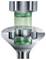 Cross-section of a metal valve assembly showing a green flow passing through a chamber into a lower outlet.<br>