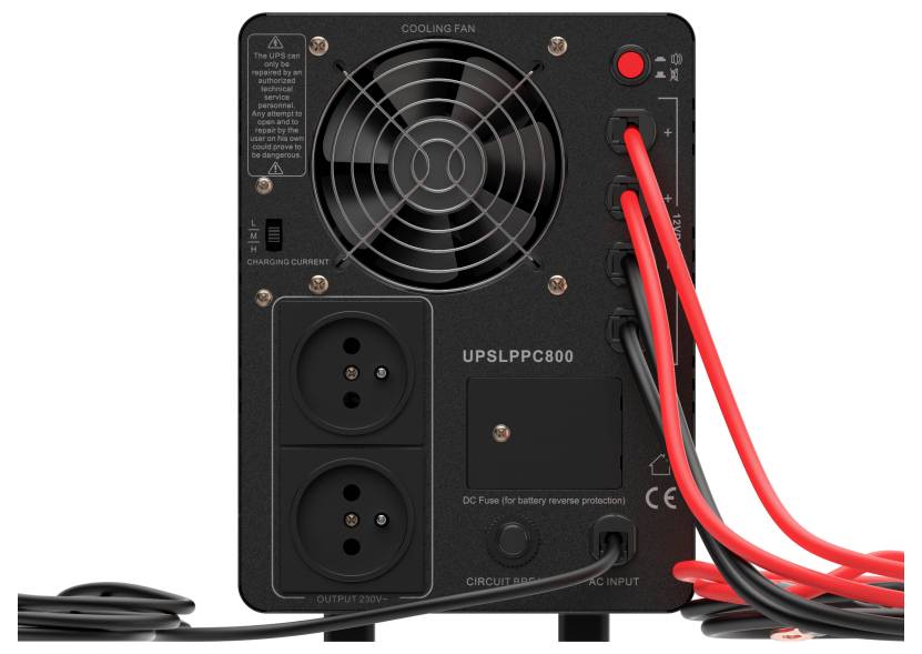 Rear view of a UPS/power backup unit showing cooling fan, power outlets, AC input, circuit breaker, and connected red and black cables.