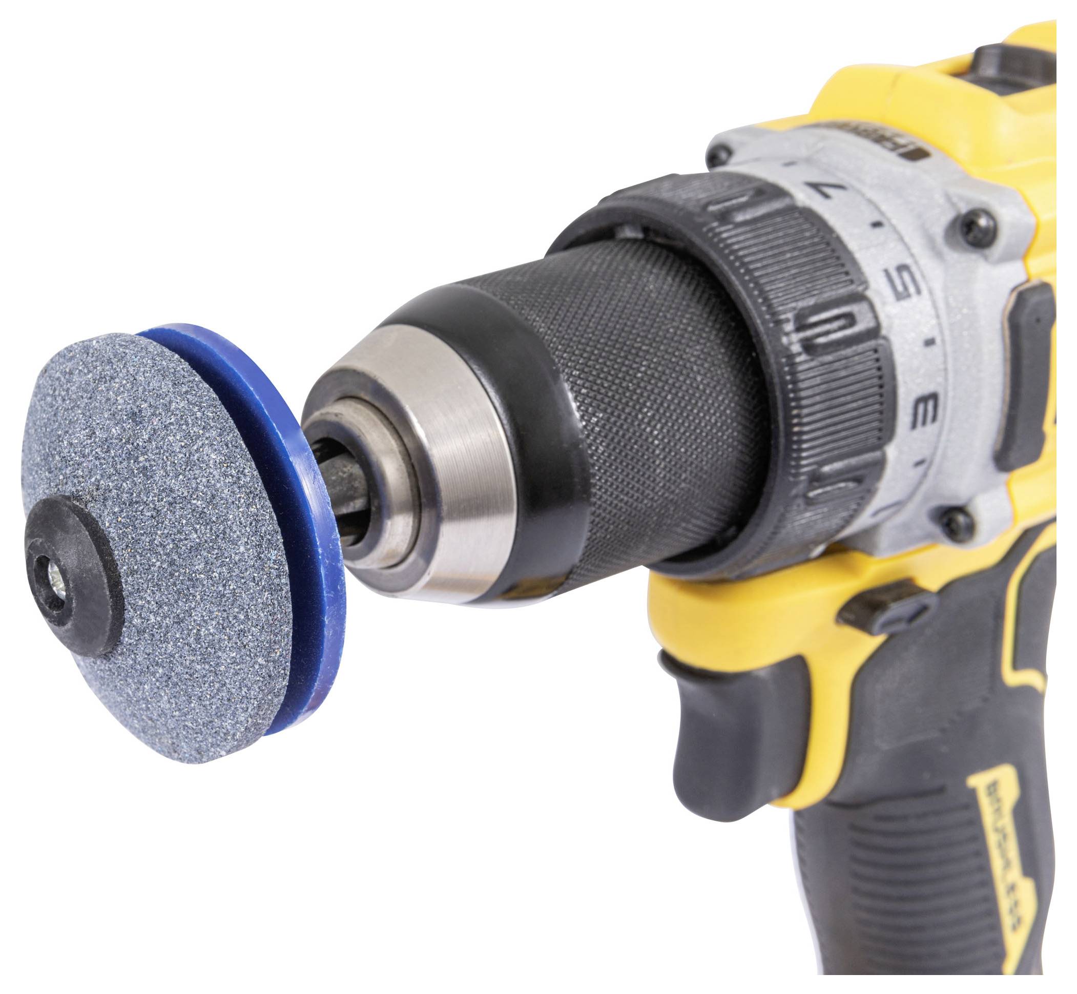 Yellow cordless drill with a grinding disc attached instead of a drill bit, shown on a white background.