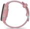 Pink wristwatch with round face, side button labeled 'RUN,' and adjustable strap on a white background.