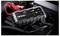 NOCO Boost HD portable car jump starter with red and black clamps connected to a vehicle battery.
