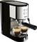 Krups espresso machine brewing two shots into glass cups, with portafilter and control buttons visible.<br>