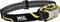 A black and yellow PETZL headlamp with an adjustable elastic strap, shown front-facing on a white background.