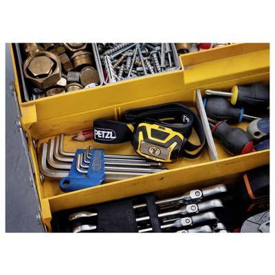 Open toolbox drawer with assorted hand tools, including hex keys, wrenches, screwdrivers, bolts, and a headlamp.
