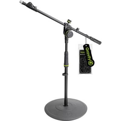 Microphone stand with a round weighted base, adjustable boom arm, and hanging package of spare rings or accessories labeled 'Gravity'.