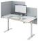 Standing desk workstation with privacy panels, monitor, keyboard, mouse, and desk mat in a minimalist office setup.