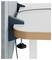Close-up of a wall-mounted desk or shelf bracket supporting a laminated tabletop, with a visible clamp and cable underneath.