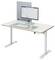 Minimal standing desk with monitor, keyboard, mouse, and privacy divider on a white tabletop.