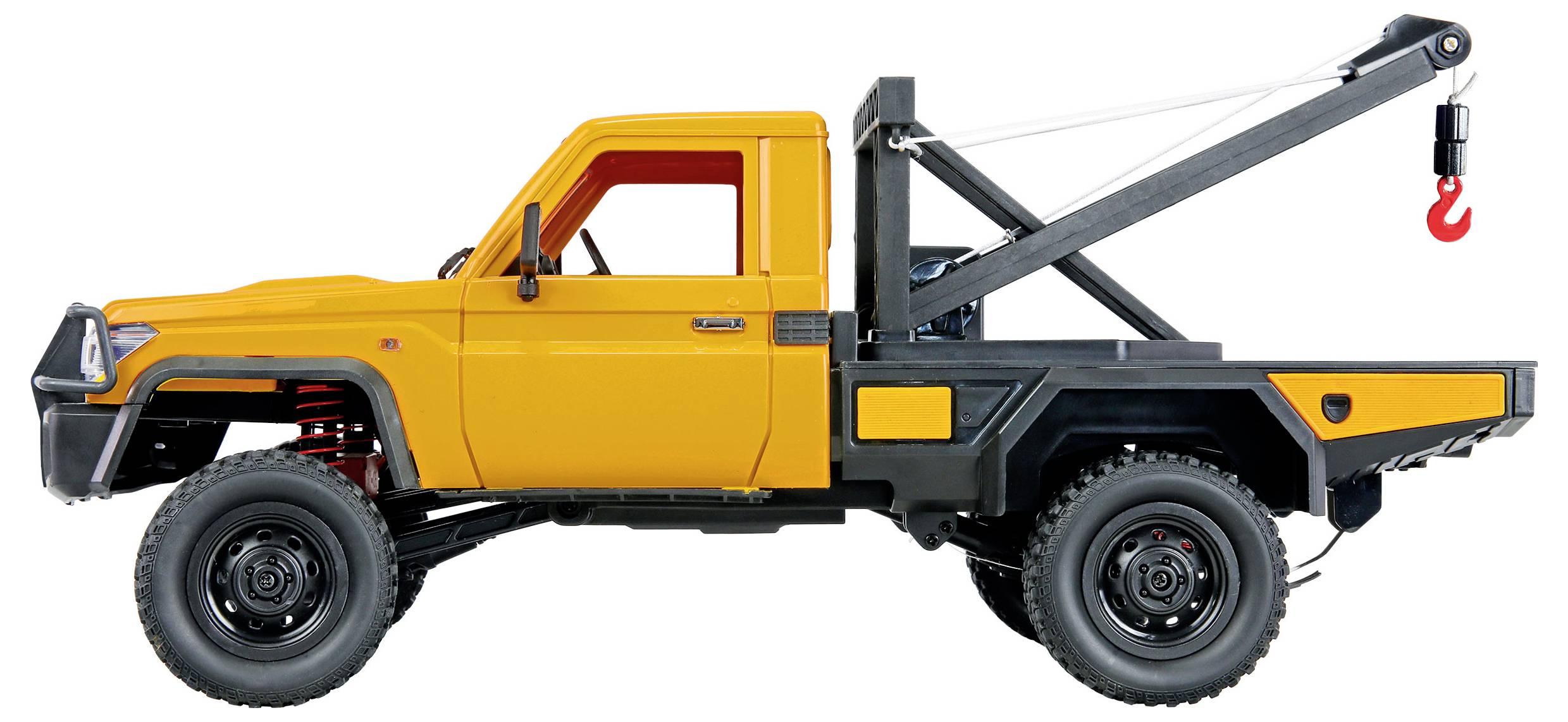 Yellow off-road tow truck with a rear-mounted crane hook, shown in side view on a white background.