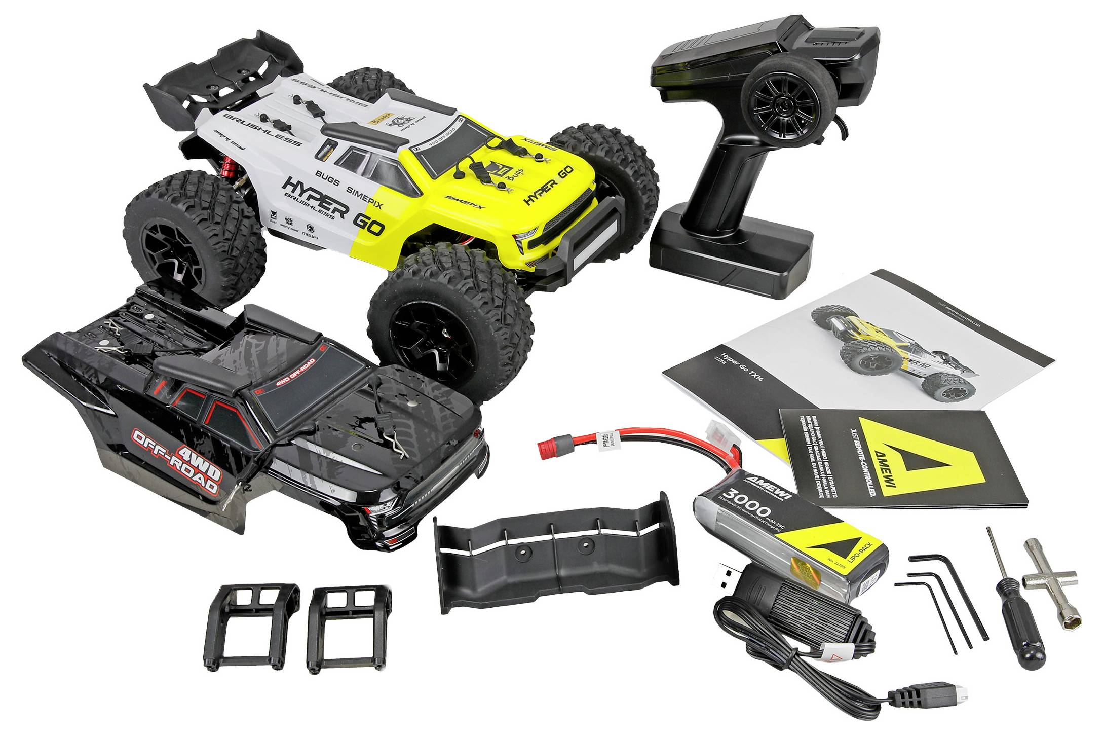 Two remote-controlled off-road trucks with transmitter, battery, charger, tools, spare parts, and instruction manual laid out on a white background.