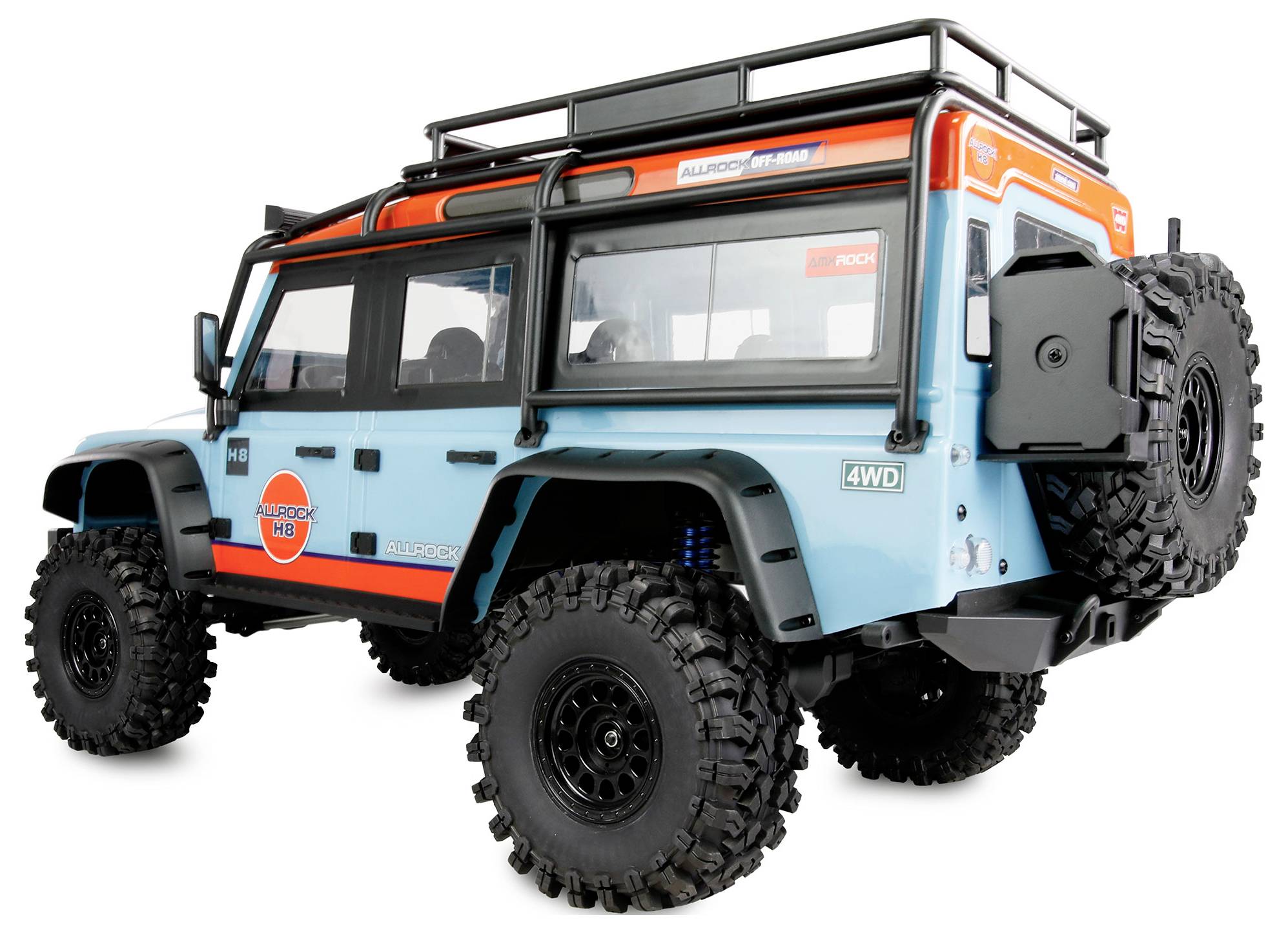 Blue and orange off-road SUV with roof rack and spare tire, shown in a side-front view on a white background.