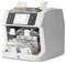 Money counting machine sorting mixed banknotes, with euro bills visible in the output tray and a display showing currency totals.
