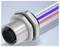 Close-up of a metal circular electrical connector with six socket pins and attached red, blue, and white wires.<br>