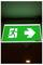 Illuminated green emergency exit sign with a running person icon and right-pointing arrow, indicating the exit direction to the right.