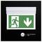 Illuminated emergency exit sign with running person and downward arrow, labeled 'Green LED indicator Light' on a dark background.