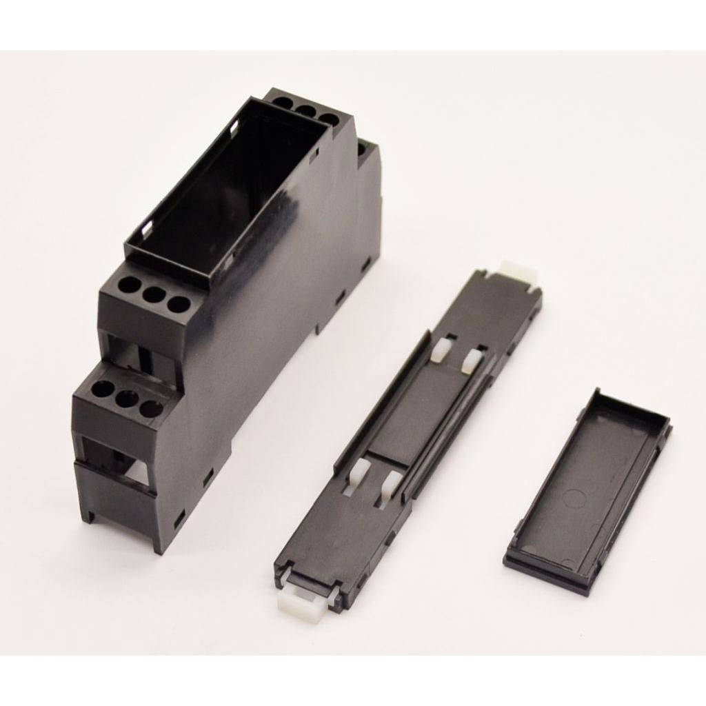 Black electrical circuit breaker components disassembled into three parts on a white background.<br>