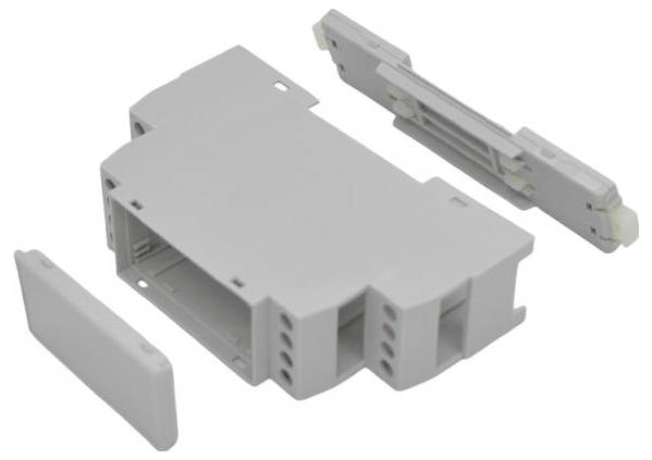 Gray modular electrical connector housing with two detached side covers shown on a white background.<br>