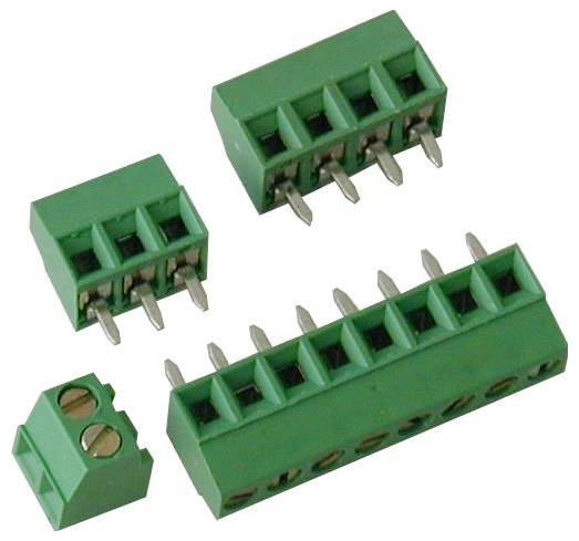 Assorted green screw terminal block connectors with metal pins, including two small, one large, and one detachable two-screw terminal.